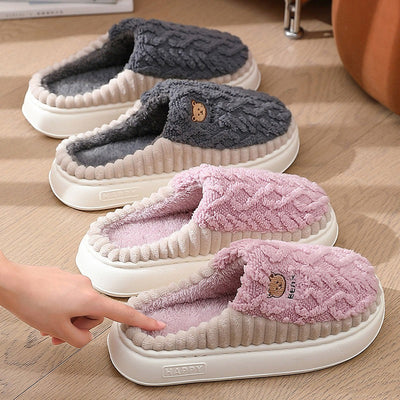 Cute bear plush slippers in gray and pink, winter warm fleece for indoor bedroom use, non-slip PVC sole.