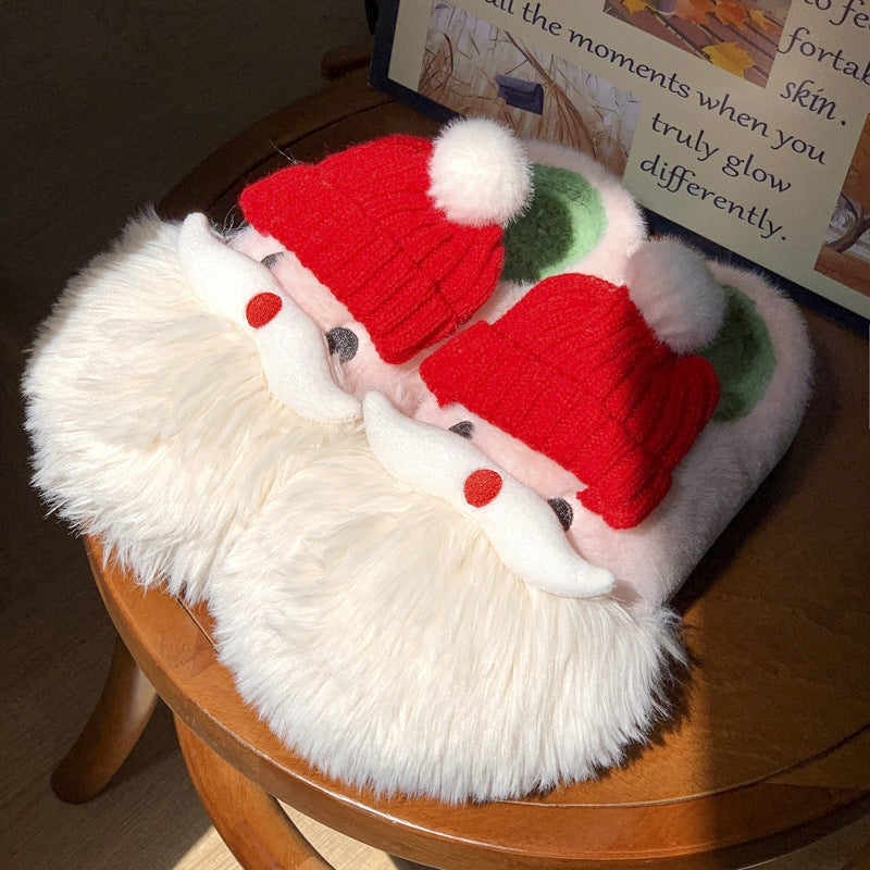 Cute Christmas Santa Claus home slippers with plush design, non-slip sole, for winter warmth.