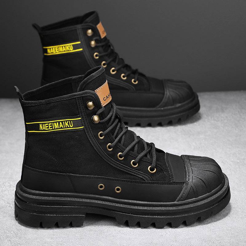 Thick-soled canvas casual men's motorcycle boots in black with front lace-up design and leather stitching.