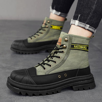 Thick-soled canvas casual sports men's motorcycle boots in green with leather stitching and lace-up design.