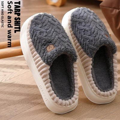 Cute bear plush slippers with non-slip PVC soles, cozy fleece material, and car stitching design.